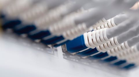 Multiple ethernet cables connecting to secure private Internet network.